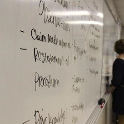 Students at a whiteboard